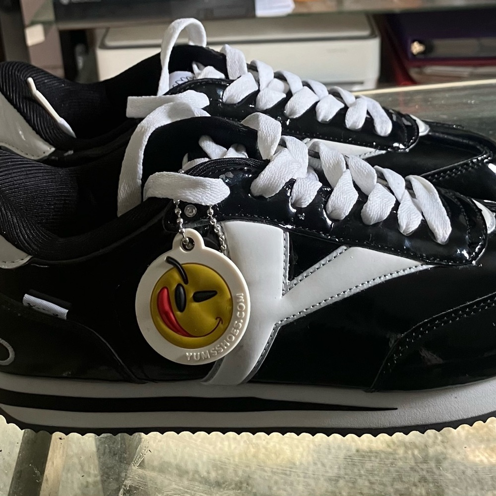 Black and White Women's Sneakers Small Scuff On Inside Of Right Shoe As Shown.